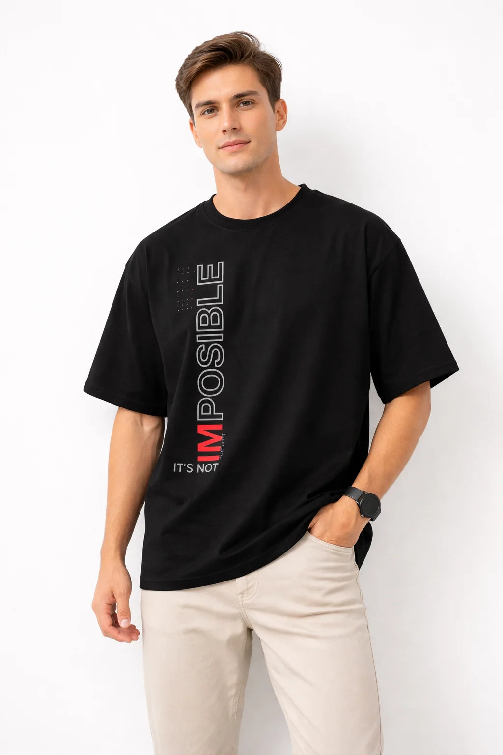 Man wearing a black t-shirt with motivational text on a white background