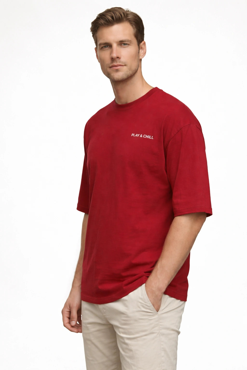 Man wearing a red t-shirt with text on a white background