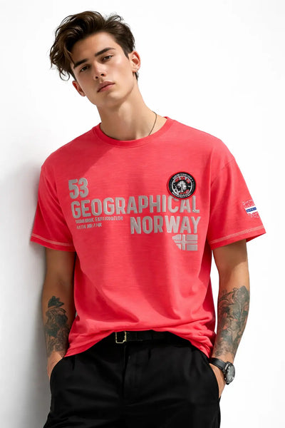 Man wearing a red 'Geographical Norway' t-shirt against a white background